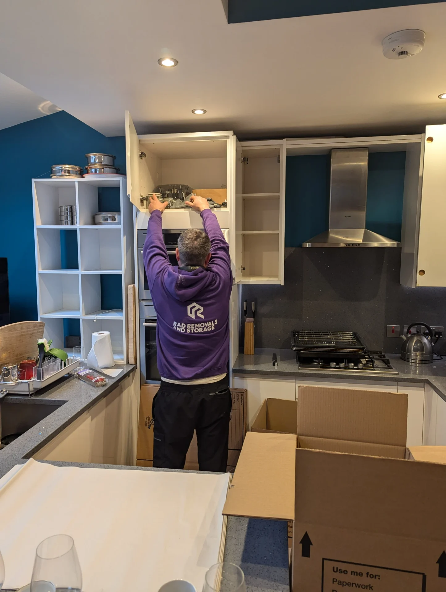RAD Removals crew packing up a family kitchen in London